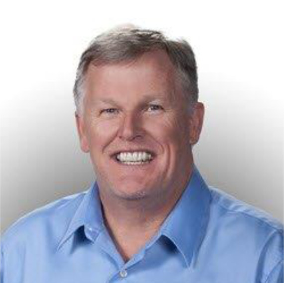 Smiling man wearing a blue shirt